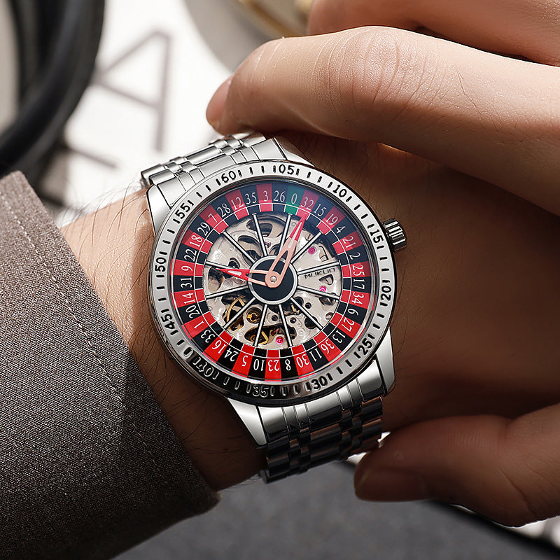 Two-tone rose gold and silver automatic watch with a roulette wheel style skeleton dial
