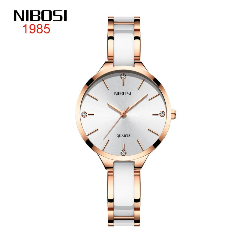 NIBOSI rose gold and white ceramic bracelet watch with crystal hour markers, front view