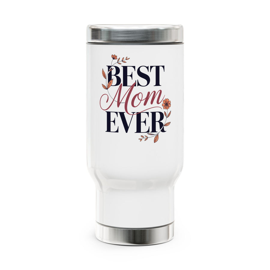 A white stainless steel travel mug with a screw-on lid, printed with "Best Mom Ever" in navy and pink lettering with small orange floral accents, on a wooden table.