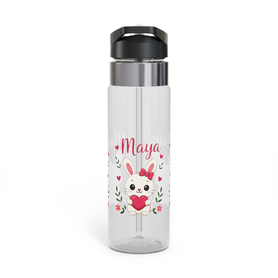 A clear water bottle with a black lid and straw, printed with a white bunny holding a red heart, pink hearts and flowers, and the name "Maya" in pink script.