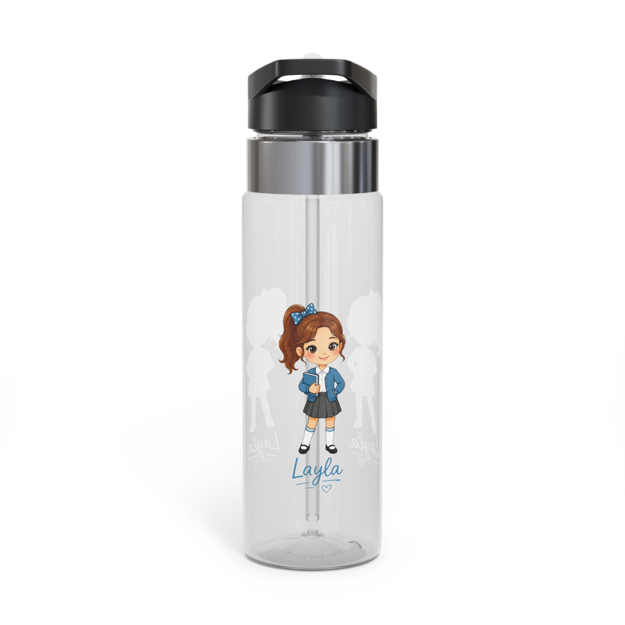 A clear Tritan water bottle with a black screw-on lid and straw, printed with a blue elementary-school-girl design and a name, styled with school supplies.