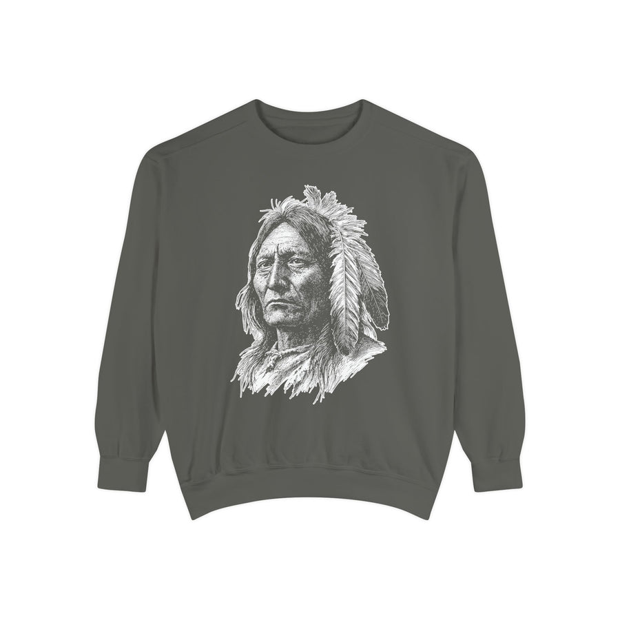 A dark gray crewneck sweatshirt printed with a detailed black-and-white portrait of a Native American elder in a feathered headdress.