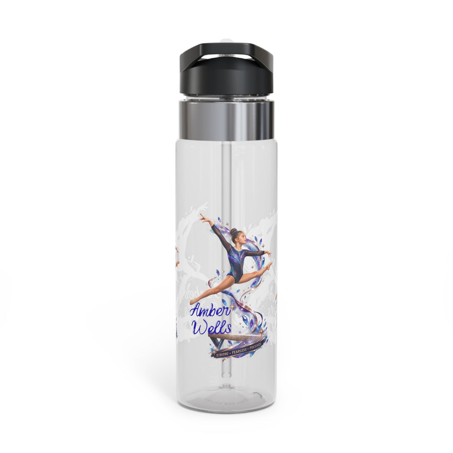 Clear plastic water bottle with a black flip lid and a straw, printed with a gymnast in a purple leotard leaping through a flowing ribbon, with the name Amber Wells in navy script below.
