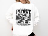 A white crewneck sweatshirt printed with an old Western town scene and the words Please be patient with me, I was born before wifi, circa 1900s.