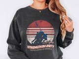 A dark gray crewneck sweatshirt printed with a flag-raising silhouette of soldiers against a striped red sunset and the words 250 Years, Strength in Unity.