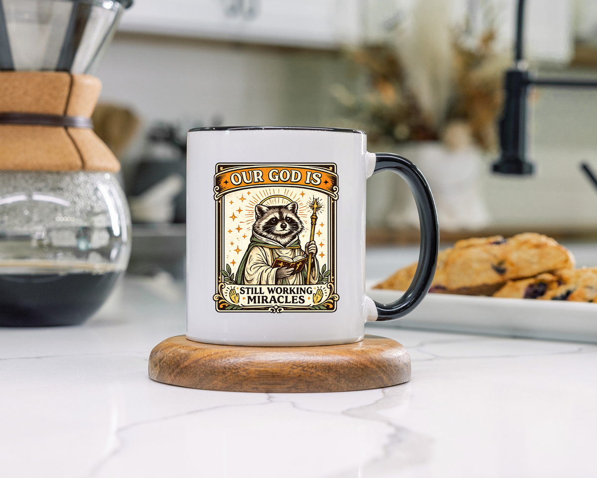 Our God Is Still Working Miracles Coffee Mug, Funny Raccoon Christian Gift for Friends, Cute Religious Parody Trash Panda Ceramic Tea Cup with Black Handle