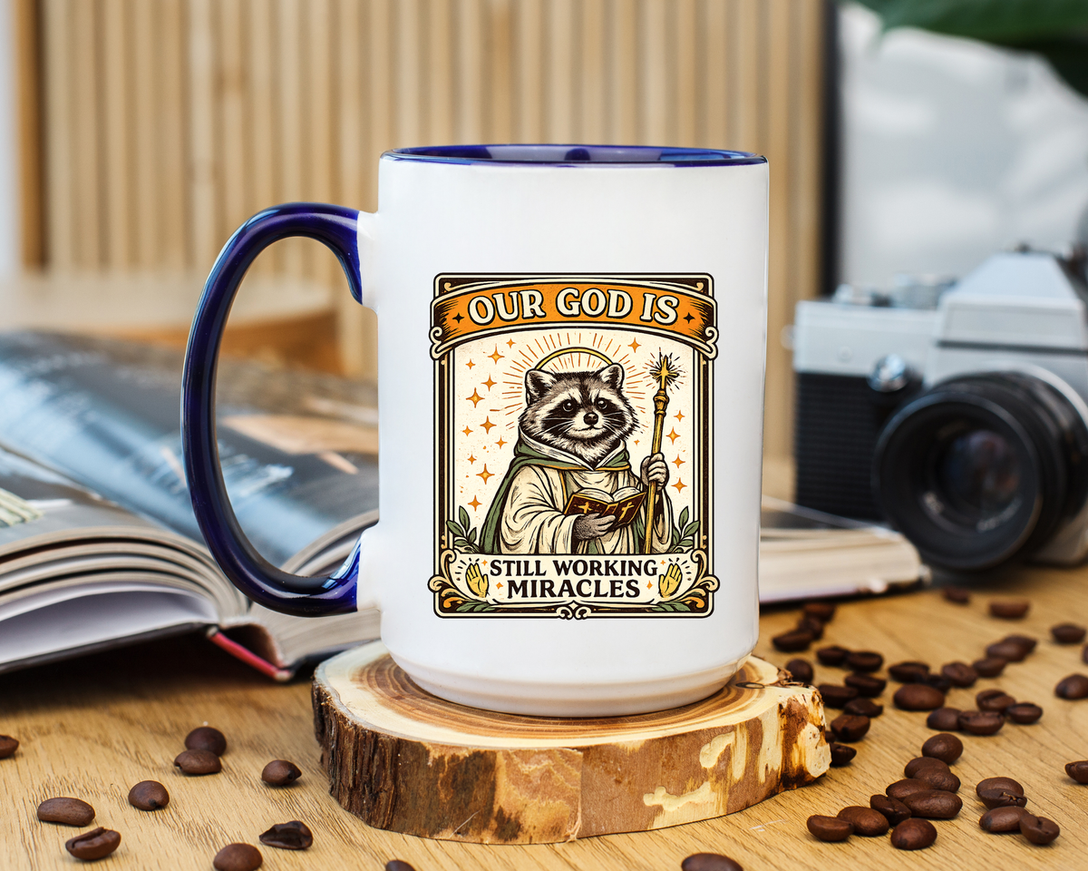 Our God Is Still Working Miracles Coffee Mug, Funny Raccoon Christian Gift for Friends, Cute Religious Parody Trash Panda Ceramic Tea Cup with Black Handle