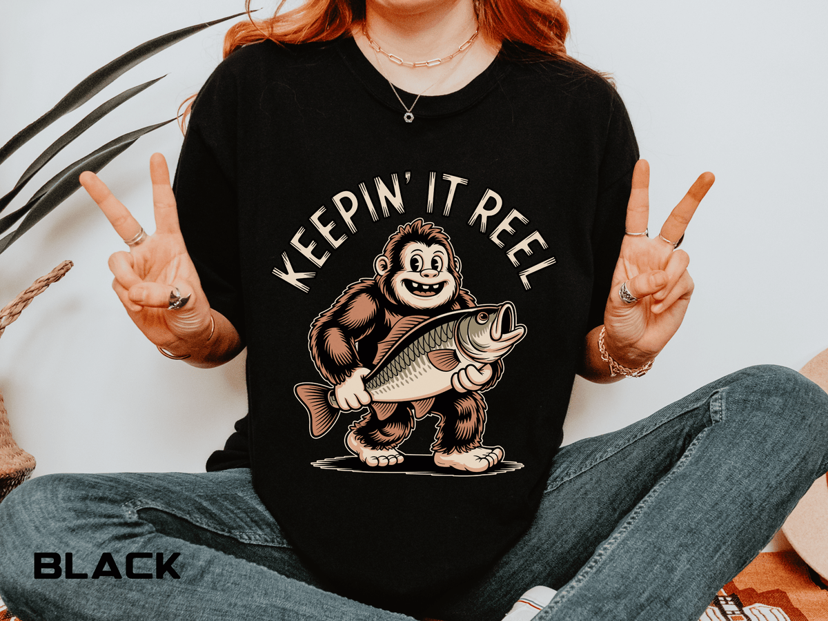 Funny Sasquatch Fishing Comfort Colors Shirt, Keepin It Reel Bigfoot Angler Tee, Fisherman Gift Shirt, Lake Life Outdoor Graphic Tee