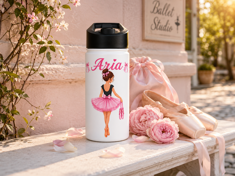 White water bottle with a black lid, printed with a ballerina in a black leotard and ruffled pink tutu holding pink pointe shoes, under the name Aria in pink script between two small bows.