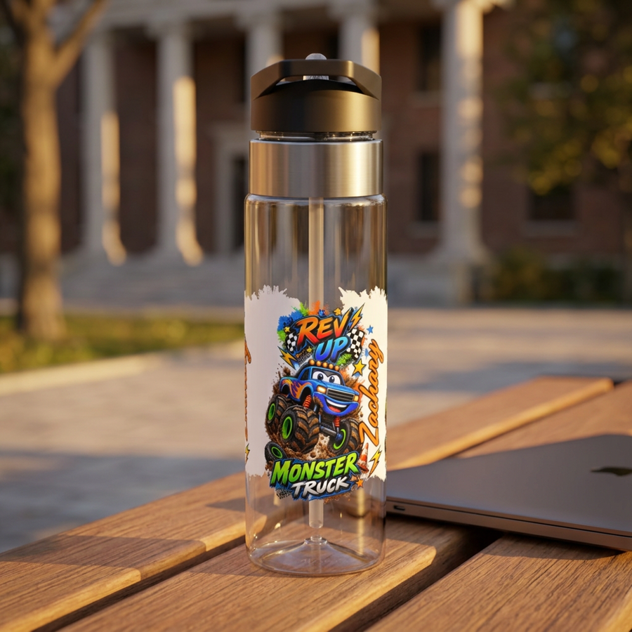 Clear plastic water bottle with a black flip lid and a straw, printed with a grinning blue monster truck on huge tyres between the words Rev Up and Monster Truck, the name Zachary beside it.