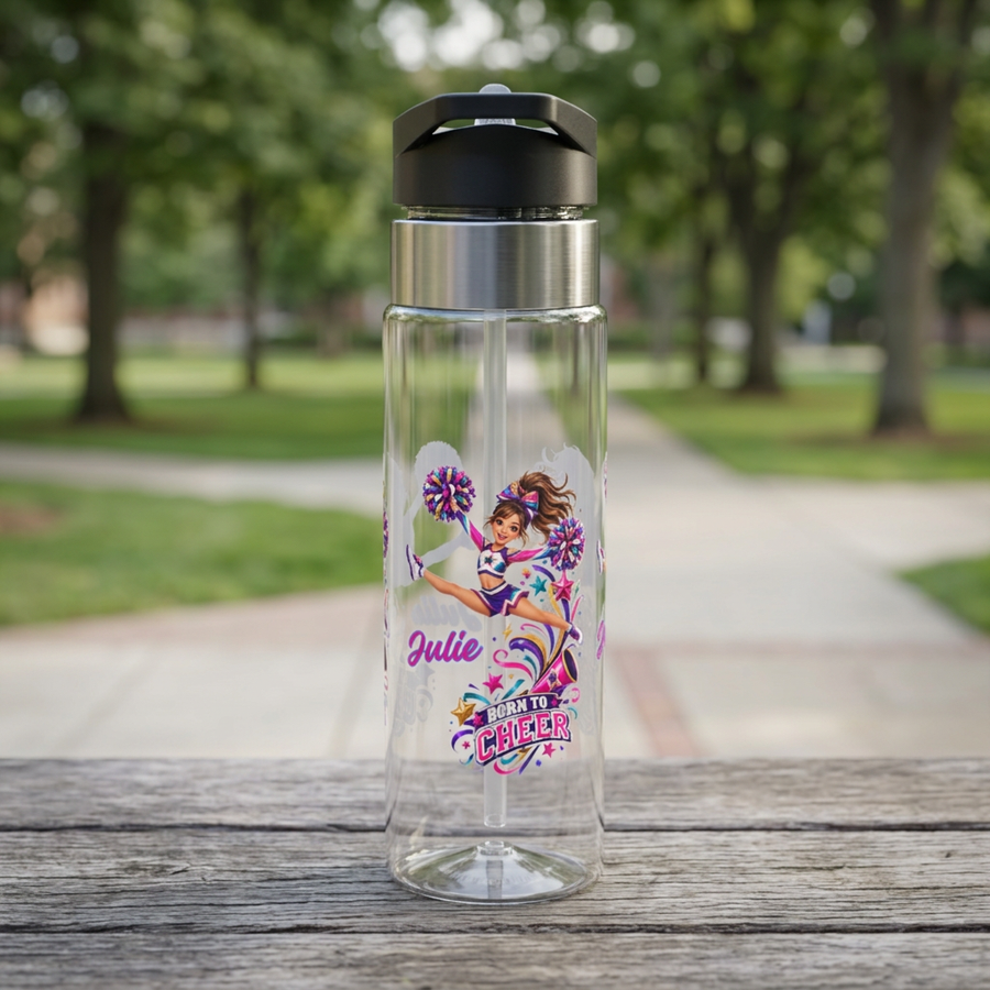 Clear plastic water bottle with a black flip lid and a straw, printed with a cheerleader leaping with pink pom-poms above the words Born To Cheer, with the name Julie in pink script.