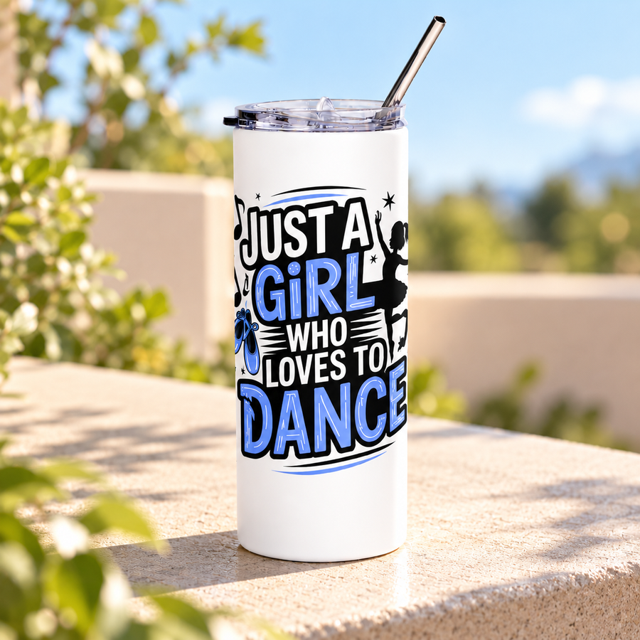 A white stainless steel skinny tumbler with a clear lid and metal straw, printed with "Just a Girl who Loves to Dance" in black and blue lettering with a ballerina silhouette, ballet slippers and music notes.