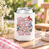 A white can cooler on a drink can, printed with "Just a Girl who Loves Birds" in pink bubble lettering with a cardinal, a blue jay, goldfinches and finches on a branch.