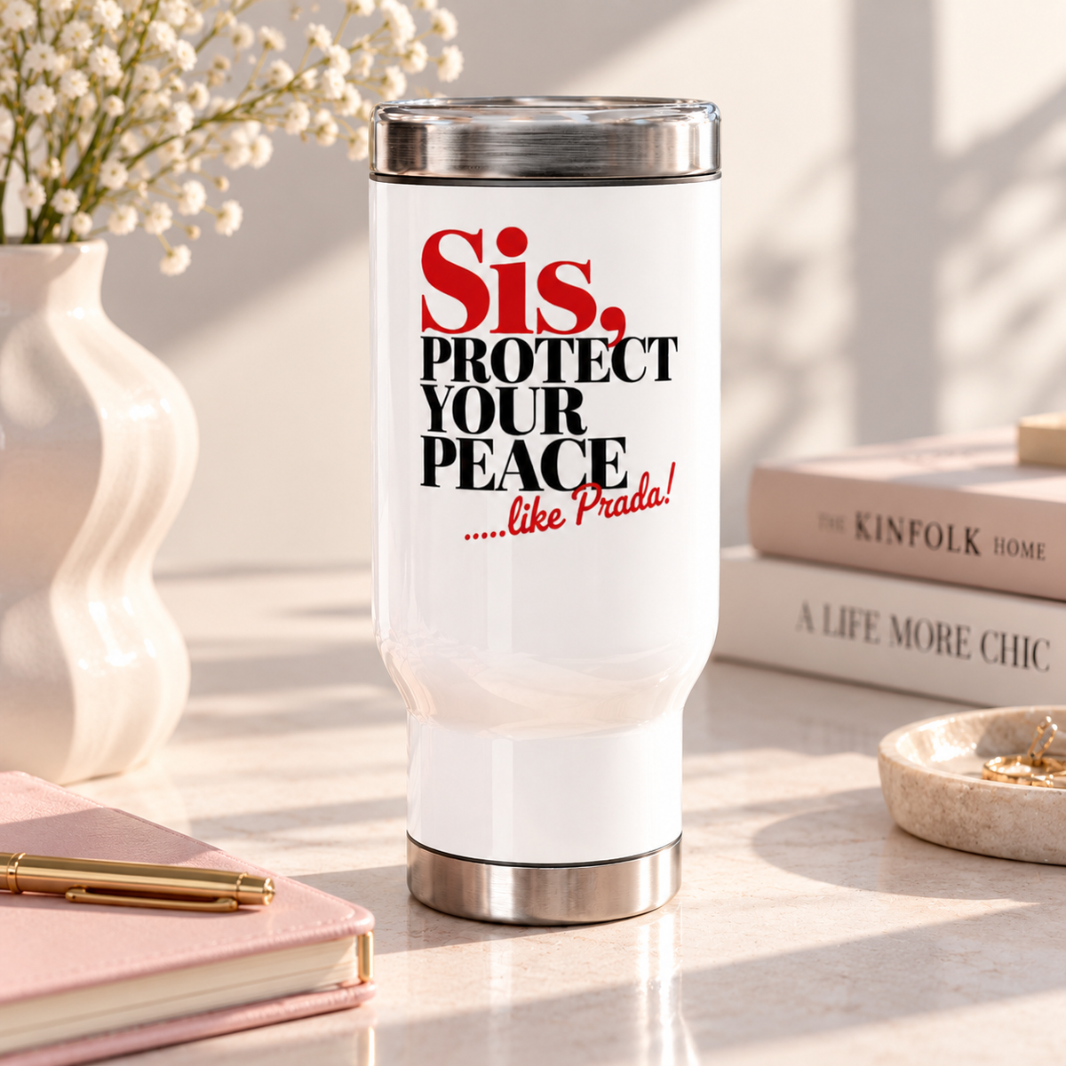 A white stainless steel travel mug with a silver lid and base, printed with "Sis, PROTECT YOUR PEACE" in bold red and black serif lettering with a short red script tagline.