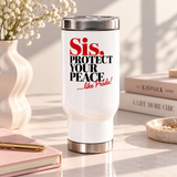 A white stainless steel travel mug with a silver lid and base, printed with "Sis, PROTECT YOUR PEACE" in bold red and black serif lettering with a short red script tagline.