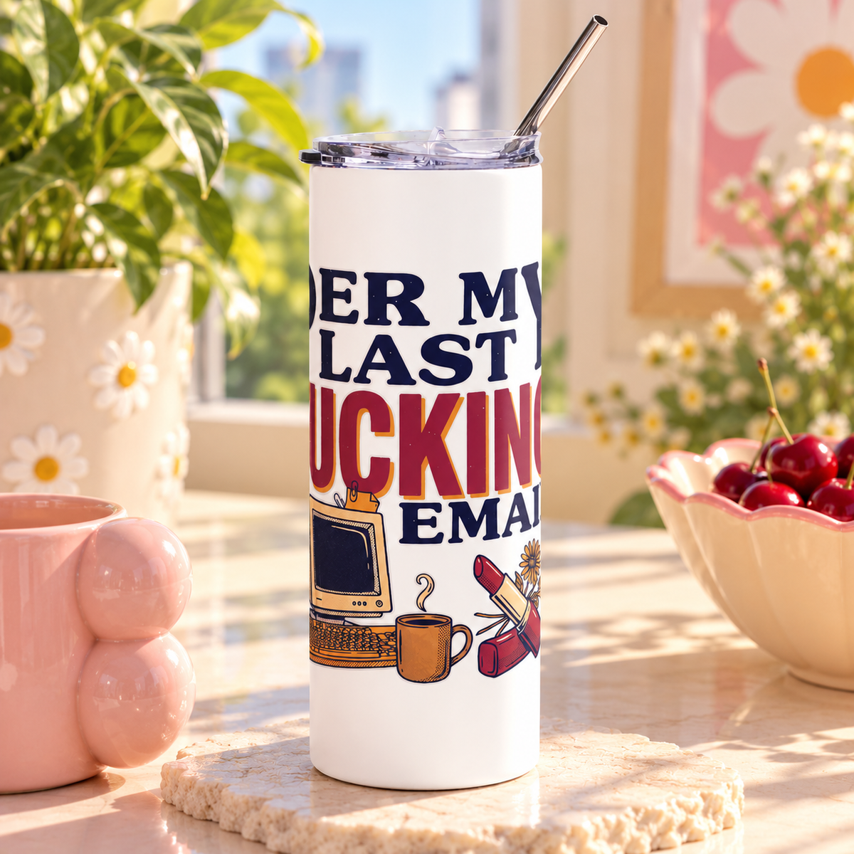 A white stainless steel skinny tumbler with a clear lid and metal straw, printed with "PER MY LAST EMAIL" with a cheeky extra word in red, above a retro computer, a coffee cup, a lipstick and flowers.
