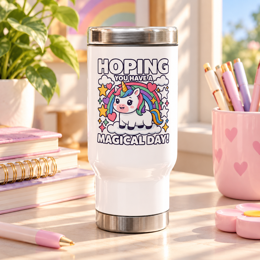 A white stainless steel travel mug with a silver lid and base, printed with "HOPING YOU HAVE A MAGICAL DAY!" around a cute unicorn on a cloud under a rainbow with stars and hearts.