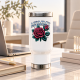 A white stainless steel travel mug with a silver lid and base, printed with "MOMMY" in chrome-style block lettering above a large pink rose and rosebud with teal leaves and small sparkles.