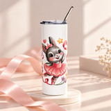 A white stainless steel skinny tumbler with a clear lid and metal straw, printed with a cute gray bunny ballerina in a pink tutu and hair bow, dancing among pink ribbons, hearts, stars and small flowers.