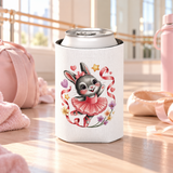 A white can cooler on a drink can, printed with a cute gray bunny ballerina in a pink tutu and hair bow, dancing among pink ribbons, hearts, stars and small flowers.