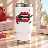 A white stainless steel travel mug with a silver lid and base, printed with distressed red lips with white teeth biting the green stem of a red rose, with falling red petals.