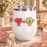 A white stainless steel stemless wine tumbler with a clear push-on lid, printed with a smiling cartoon red heart holding hands with a smiling yellow peace sign character, with small sparkles.