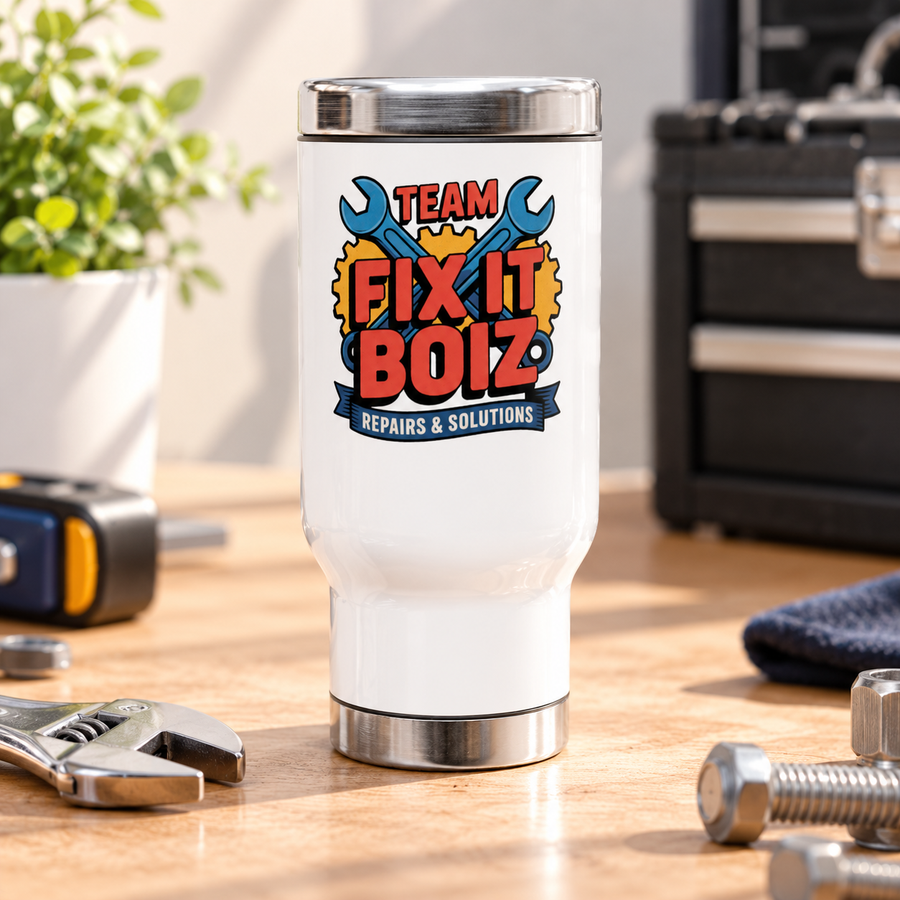 A white stainless steel travel mug with a silver lid and base, printed with "TEAM FIX IT BOIZ" in bold red lettering over crossed blue wrenches and yellow gears, above a "REPAIRS & SOLUTIONS" banner.