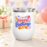 A white stainless steel stemless wine tumbler with a clear push-on lid, printed with "Happy Birthday" in pink and blue script under party bunting, with balloons, party hats and an orange "TO YOU" banner.