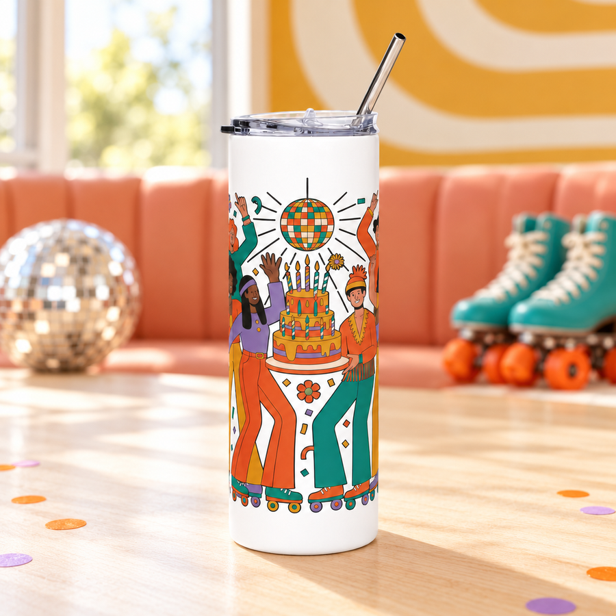 A white stainless steel skinny tumbler with a clear lid and metal straw, printed with a group of roller skaters in 70s flares dancing around a tiered birthday cake under a disco ball, in orange, teal, mustard and lavender.