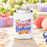 A white can cooler on a drink can, printed with "Happy Birthday" in pink and blue script under party bunting, with balloons, party hats and an orange "TO YOU" banner.