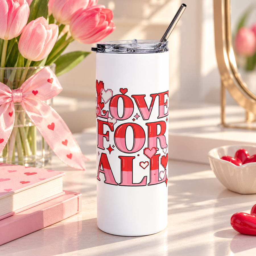 A white stainless steel skinny tumbler with a clear lid and metal straw, printed with "LOVE FOR ALL" in striped red and pink block lettering with pixel-style hearts and sparkles.