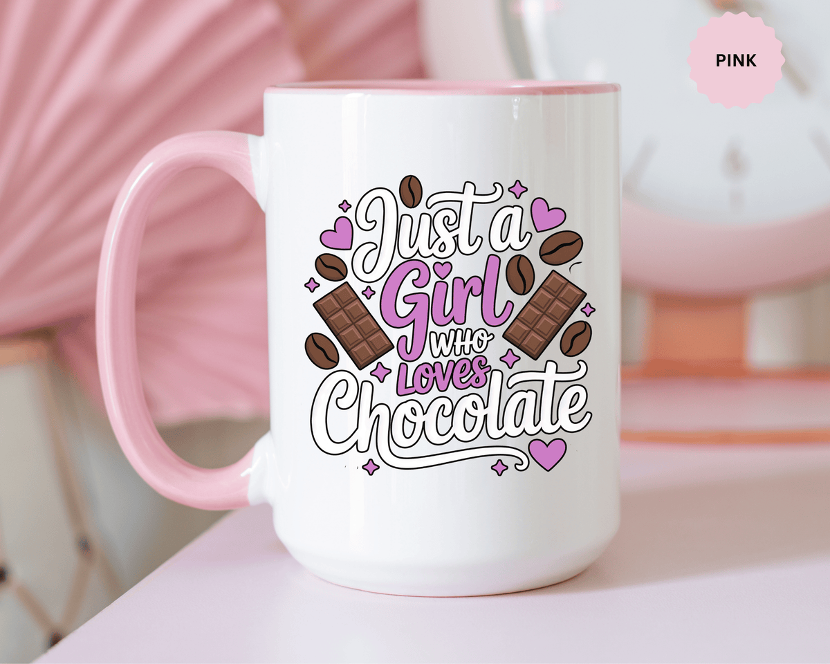 A white ceramic mug with a colored handle and interior, printed with "Just a Girl who Loves Chocolate" in white and purple lettering with chocolate bars, cocoa beans and purple hearts.