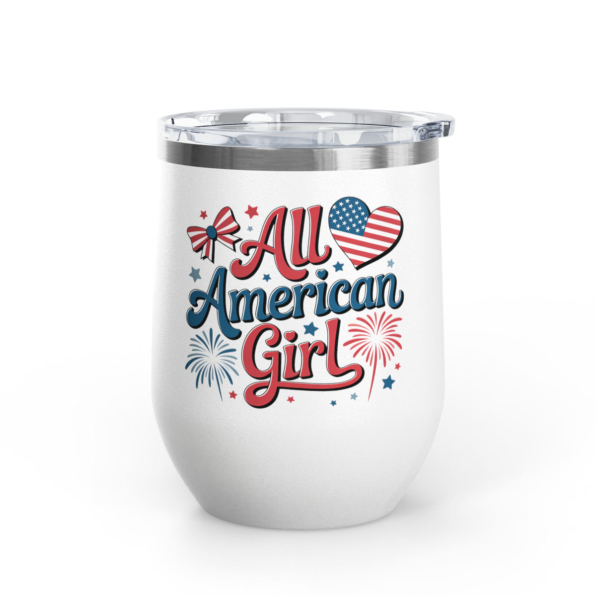 A white stainless steel wine tumbler with a clear push-on lid, printed with 'All American Girl' in red and blue script, a flag-patterned heart, bow, and fireworks, on a plain white background.
