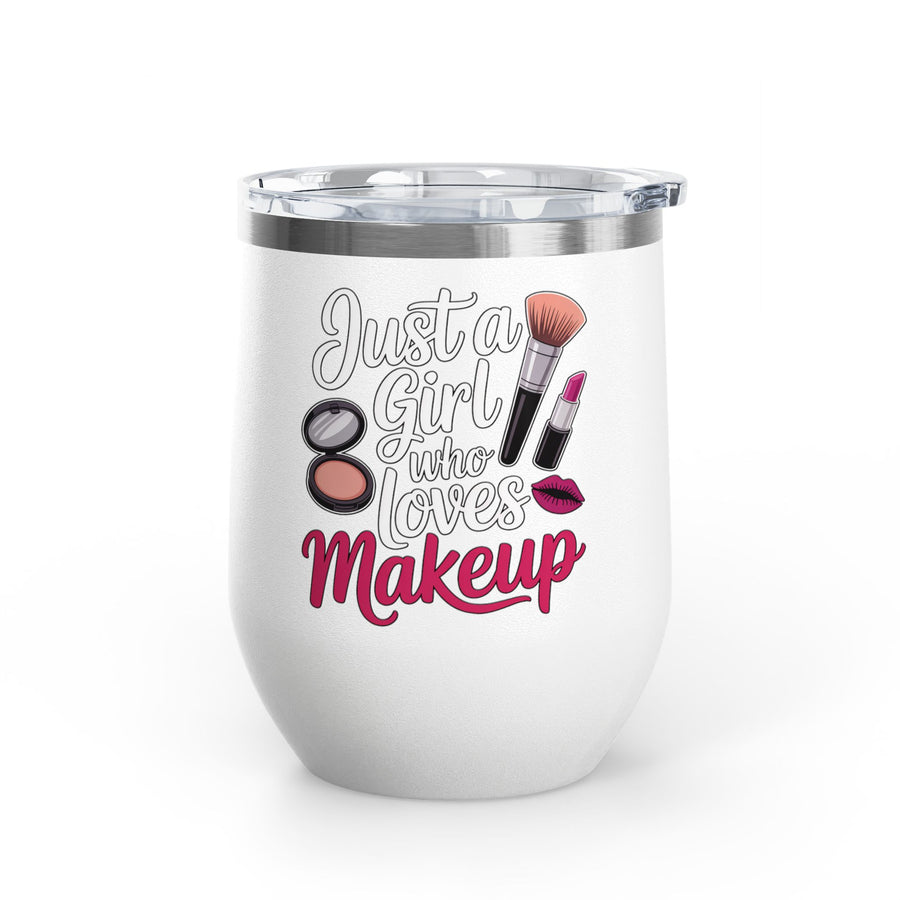 A white stainless steel stemless wine tumbler with a clear push-on lid, printed with "Just a Girl who Loves Makeup" in white script and magenta lettering with a makeup brush, lipstick, a compact and lips.