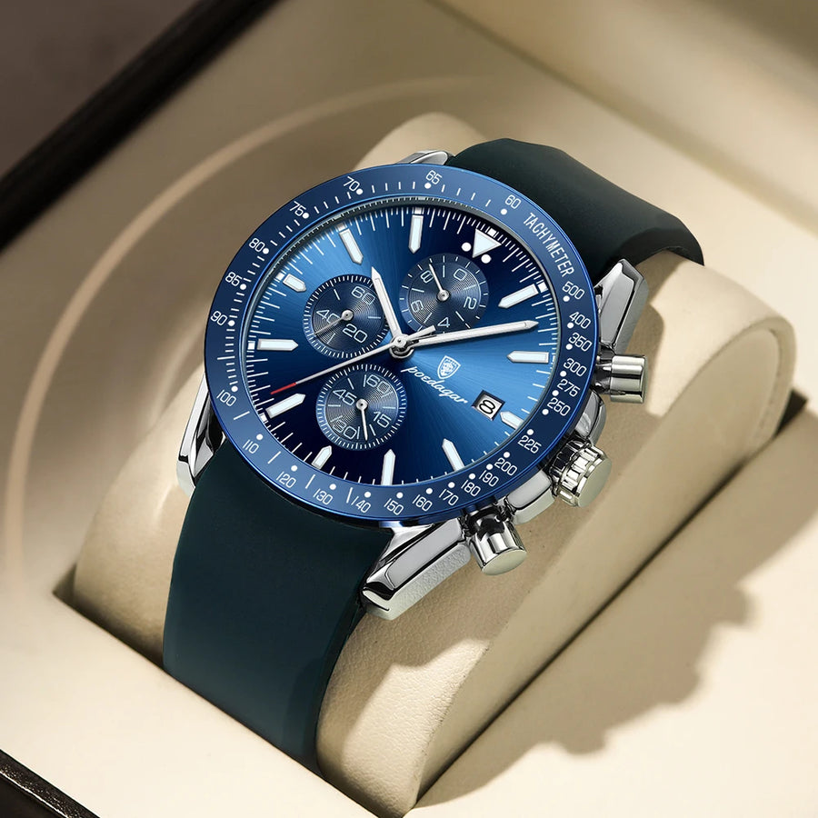 Blue chronograph watch with a tachymeter bezel, date window, and matching blue rubber strap