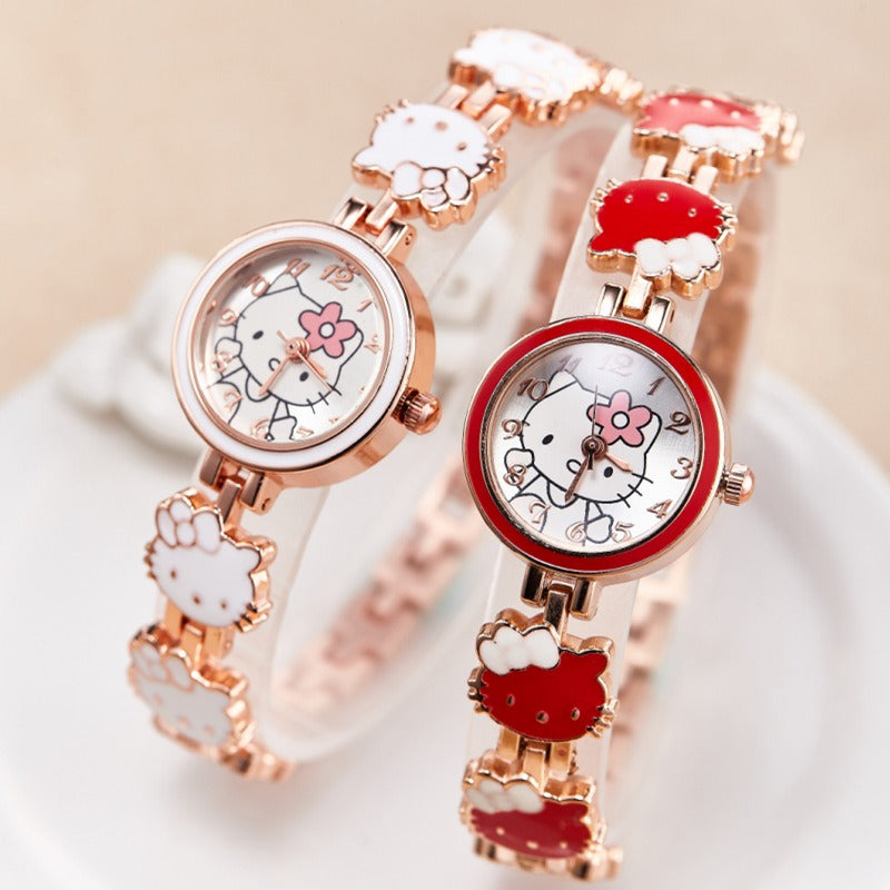 Two rose gold bracelet watches with cartoon cat character dials, white and red link bands