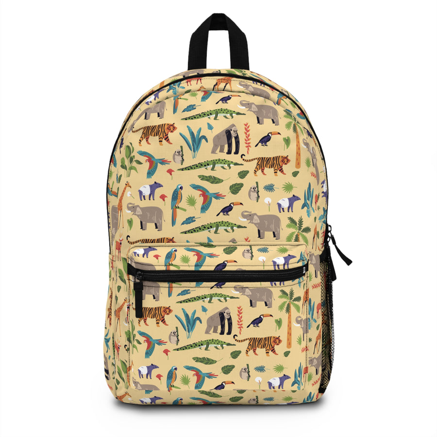 A kids backpack with a black top handle, front zip pocket and mesh side pocket, soft yellow with an all-over print of tigers, elephants, gorillas, crocodiles, tapirs, parrots, toucans and palm leaves.