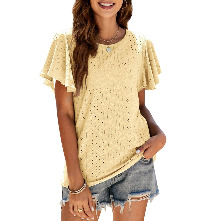 The same eyelet knit top shown in seven colourways, lilac, black, white, yellow, pink, mint and mauve, each with short flutter sleeves and a plain round neckline, each worn with frayed denim shorts.