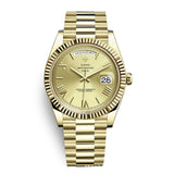 Gold-tone watch with a fluted bezel, champagne dial with day/date windows, and a matching metal bracelet