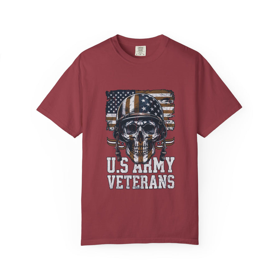 A woman wearing a red t-shirt printed with a skull in a stars-and-stripes army helmet over an American flag, above U.S. Army Veterans.