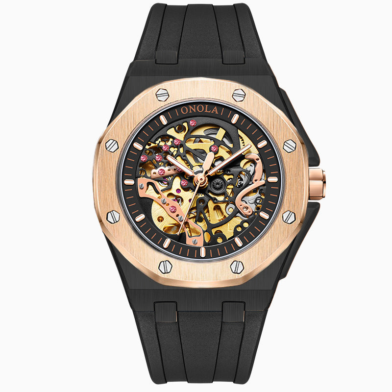 Black and rose gold automatic watch with an exposed skeleton dial and black silicone strap