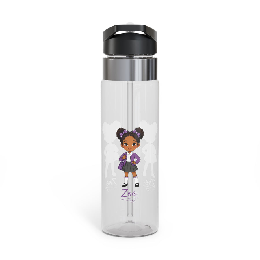 A clear Tritan water bottle with a black screw-on lid and straw, printed with a purple elementary-school-girl design and a name, styled with school supplies.