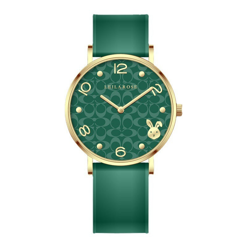 Red and green women's watches with gold rabbit dial design and matching silicone straps