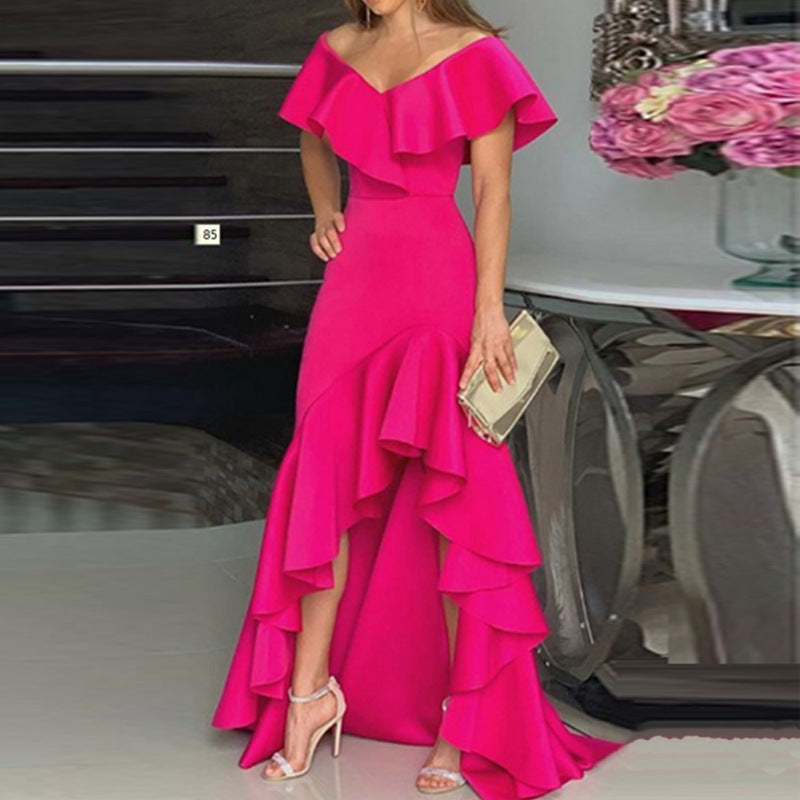 The same long dress shown in five colourways, black, teal, blue, red and fuchsia, each with a wide ruffled off shoulder neckline and a tiered high low ruffled hem, each carried with a pale gold clutch.