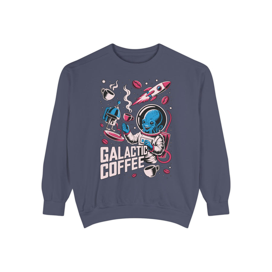 Terracotta sweatshirt printed with a blue alien in a spacesuit raising a coffee cup beside a rocket and a stovetop pot, headed Galactic Coffee, with cups and beans drifting around them.