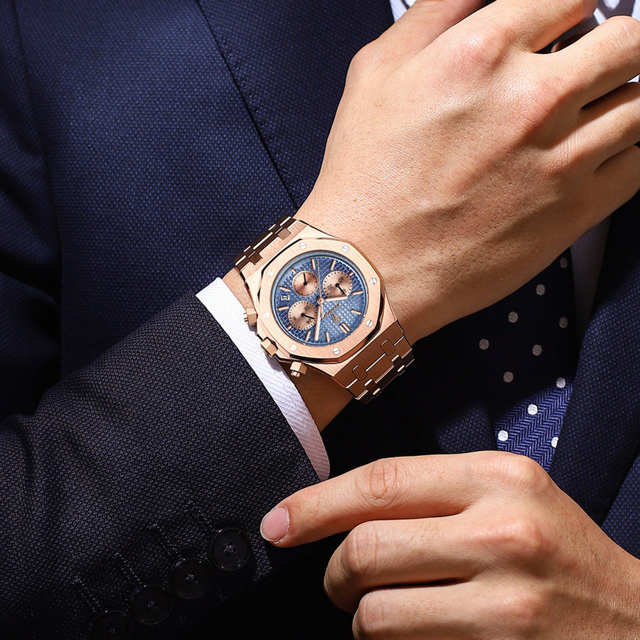 Silver stainless steel chronograph watch with an octagonal bezel, black textured dial, three subdials, and a matching steel bracelet.