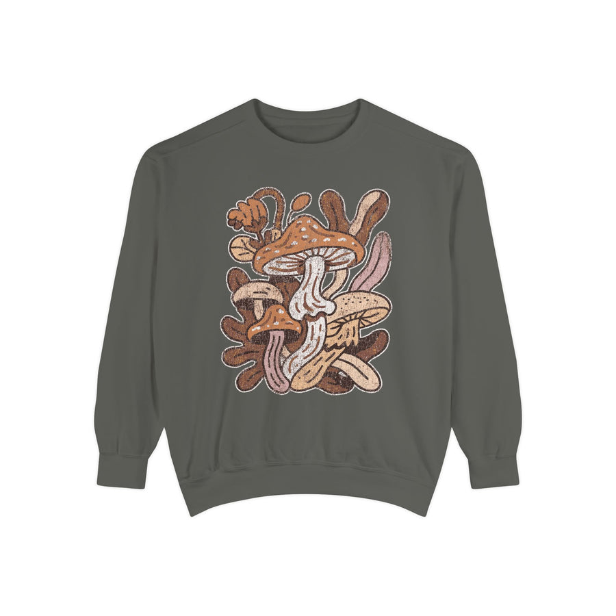 A dark gray crewneck sweatshirt printed with a retro cluster of brown and tan mushrooms among leaves.