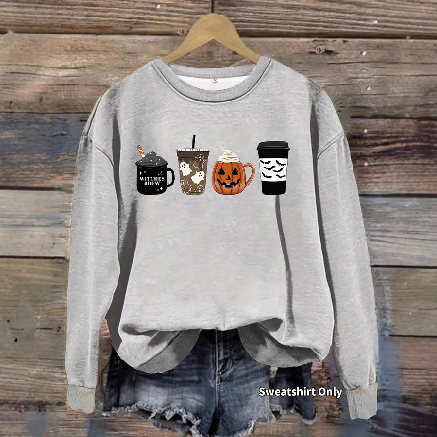 A red crewneck sweatshirt printed with a row of four Halloween coffee cups, including a witches brew mug and a jack-o'-lantern cup.