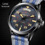 Black pilot style automatic watch with day and date windows and a striped nylon strap