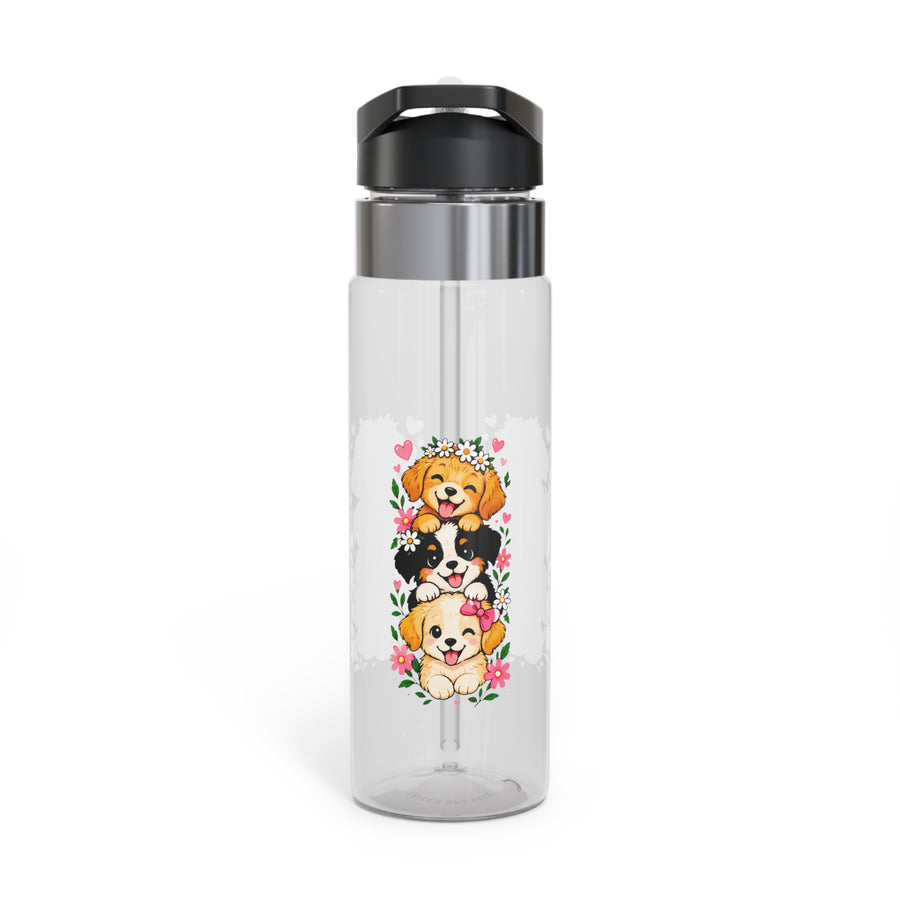 A clear water bottle with a black flip-top lid, stainless band and straw, printed with three stacked cartoon puppies with pink flowers, bows and hearts.